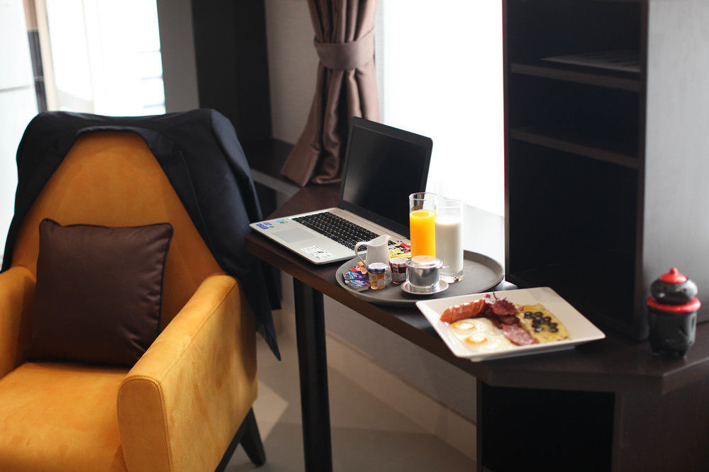Compass Living Joy Aparthotel โฮจิมินห์ซิตี้ ภายนอก รูปภาพ